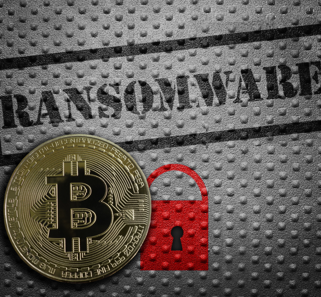 A metal background with the words ransomware and a lock icon.