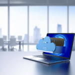 A laptop with a cloud shaped filling cabinet coming out of the screen.