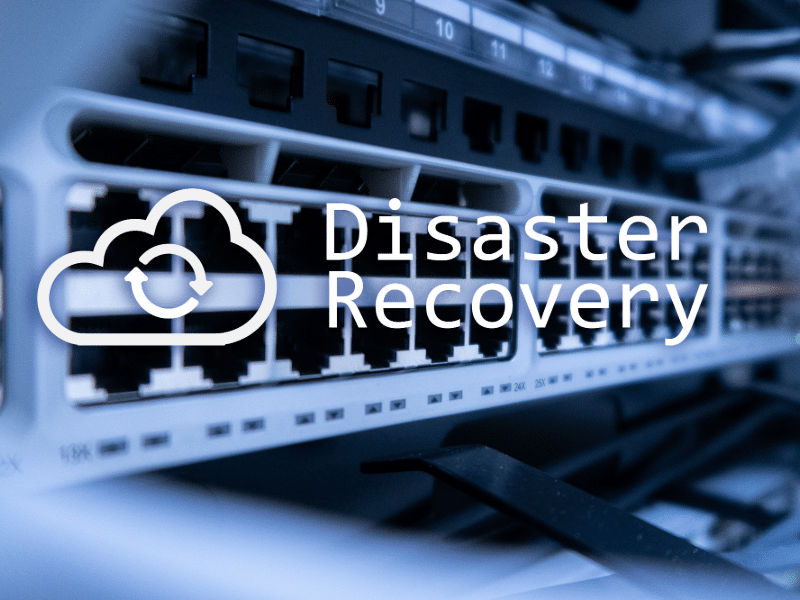 A server rack with a disaster recovery icon in front of it.